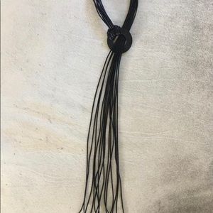 Black leather cord adjustable necklace XL with black 3 in diameter wood ring.